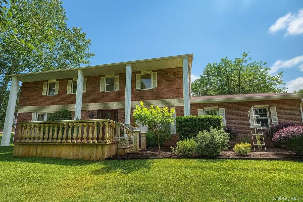 Exterior, Facade, Brick Facade, Raised Ranch