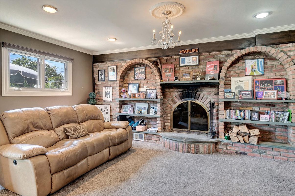 Chandelier, Fireplace, Interior, Living room, Recessed Lighting, Stone Walls