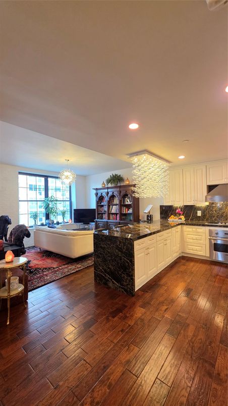 Chandelier, Interior, Kitchen, Living room, Recessed Lighting, Stainless Steel Appliances, Wood Texture Flooring
