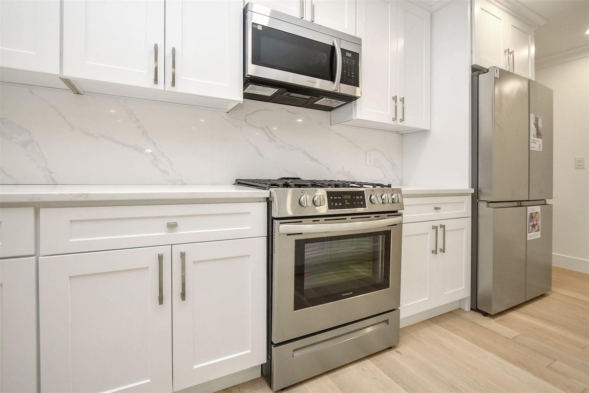 Interior, Kitchen, Marble Walls, Stainless Steel Appliances, Wood Texture Flooring