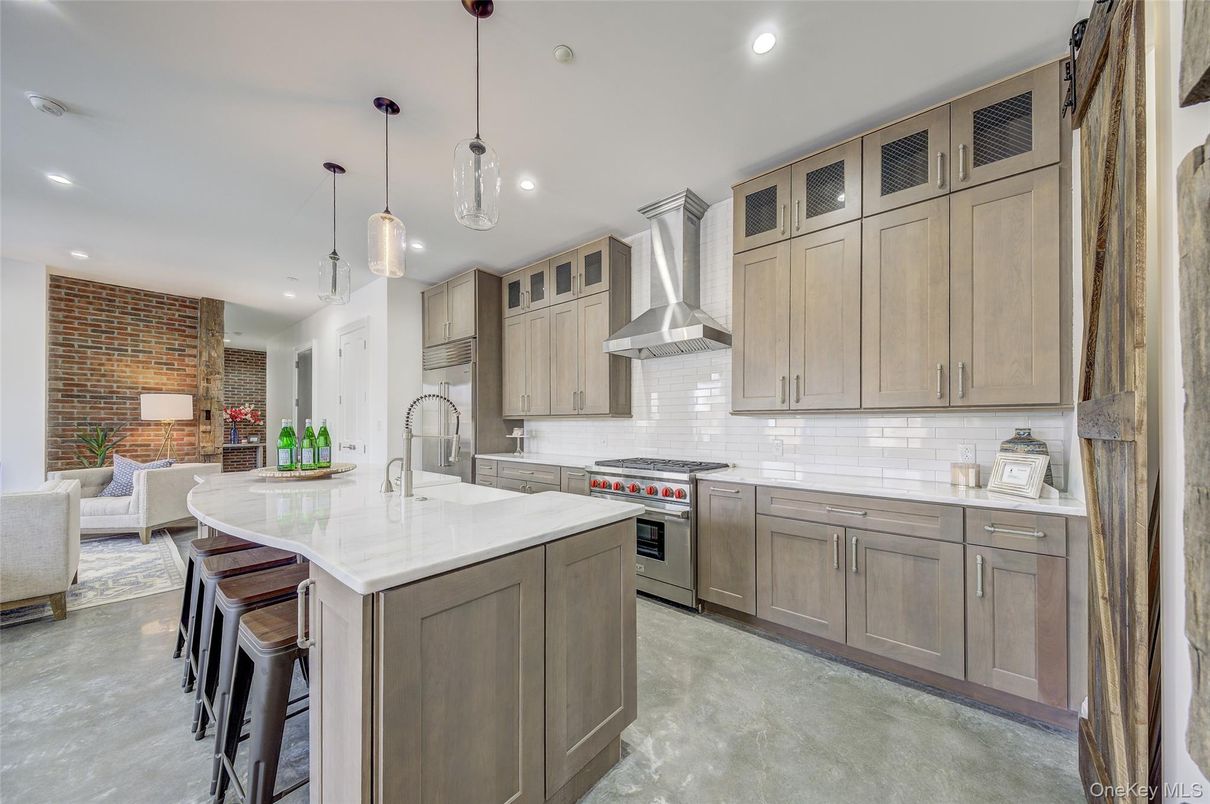 Interior, Kitchen, Pendant Lights, Recessed Lighting, Stainless Steel Appliances, Stone Walls