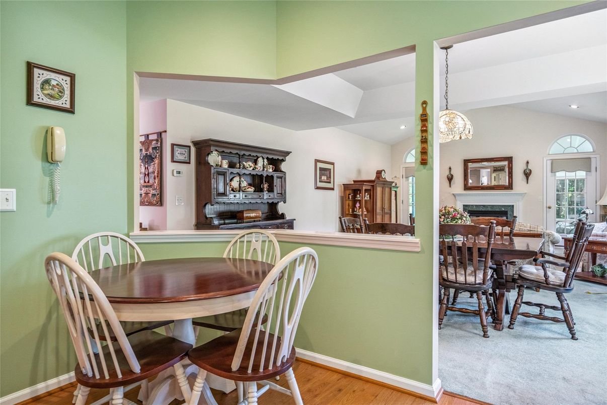 Dining room, Fireplace, Interior, Pendant Lights, Recessed Lighting, Wood Texture Flooring