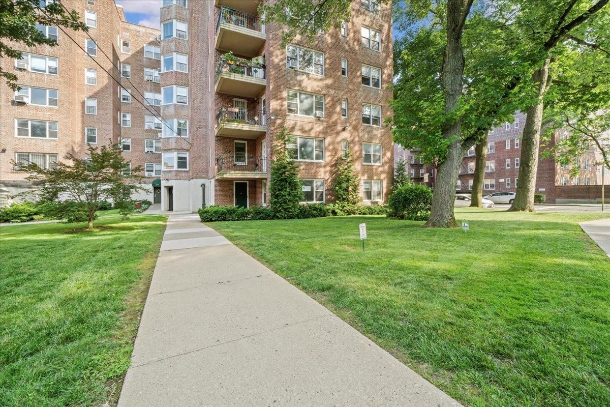 Backyard, Exterior, Facade, Brick Facade, Condo Building