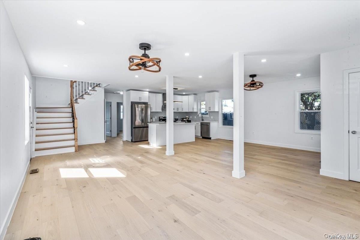 Chandelier, Interior, Kitchen, Recessed Lighting, Stainless Steel Appliances, Wood Texture Flooring