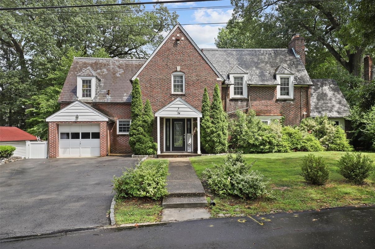 Attached, Exterior, Facade, Brick Facade, Tudor Revival