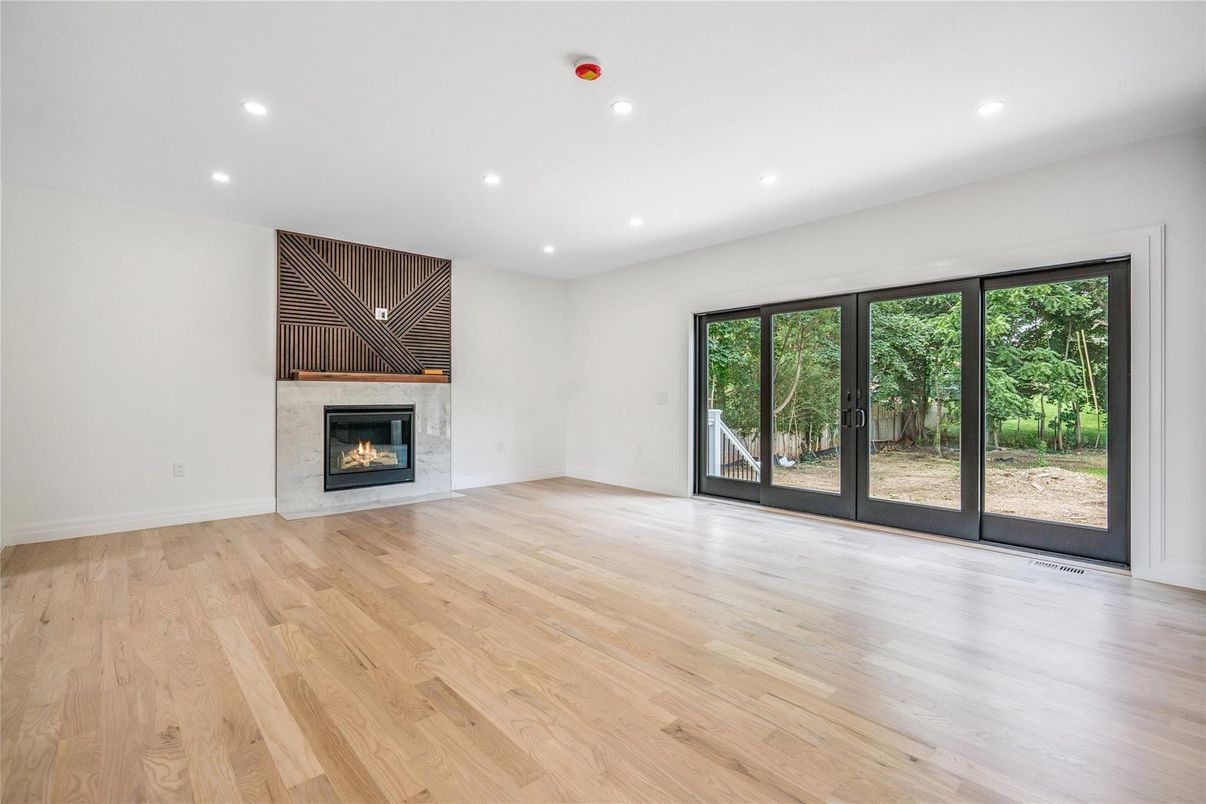 Empty room, Fireplace, Interior, Recessed Lighting, Wood Texture Flooring