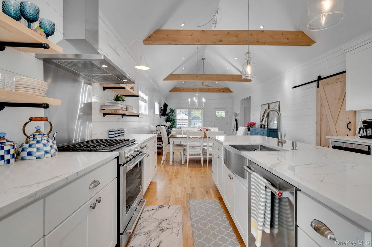 Dining room, Interior, Kitchen, Pendant Lights, Recessed Lighting, Stainless Steel Appliances, Wooden Beams, Wood Texture Flooring