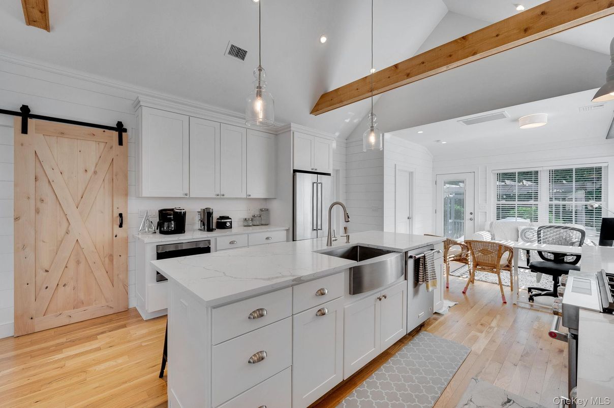 Dining room, Interior, Kitchen, Pendant Lights, Recessed Lighting, Stainless Steel Appliances, Wooden Beams, Wood Texture Flooring