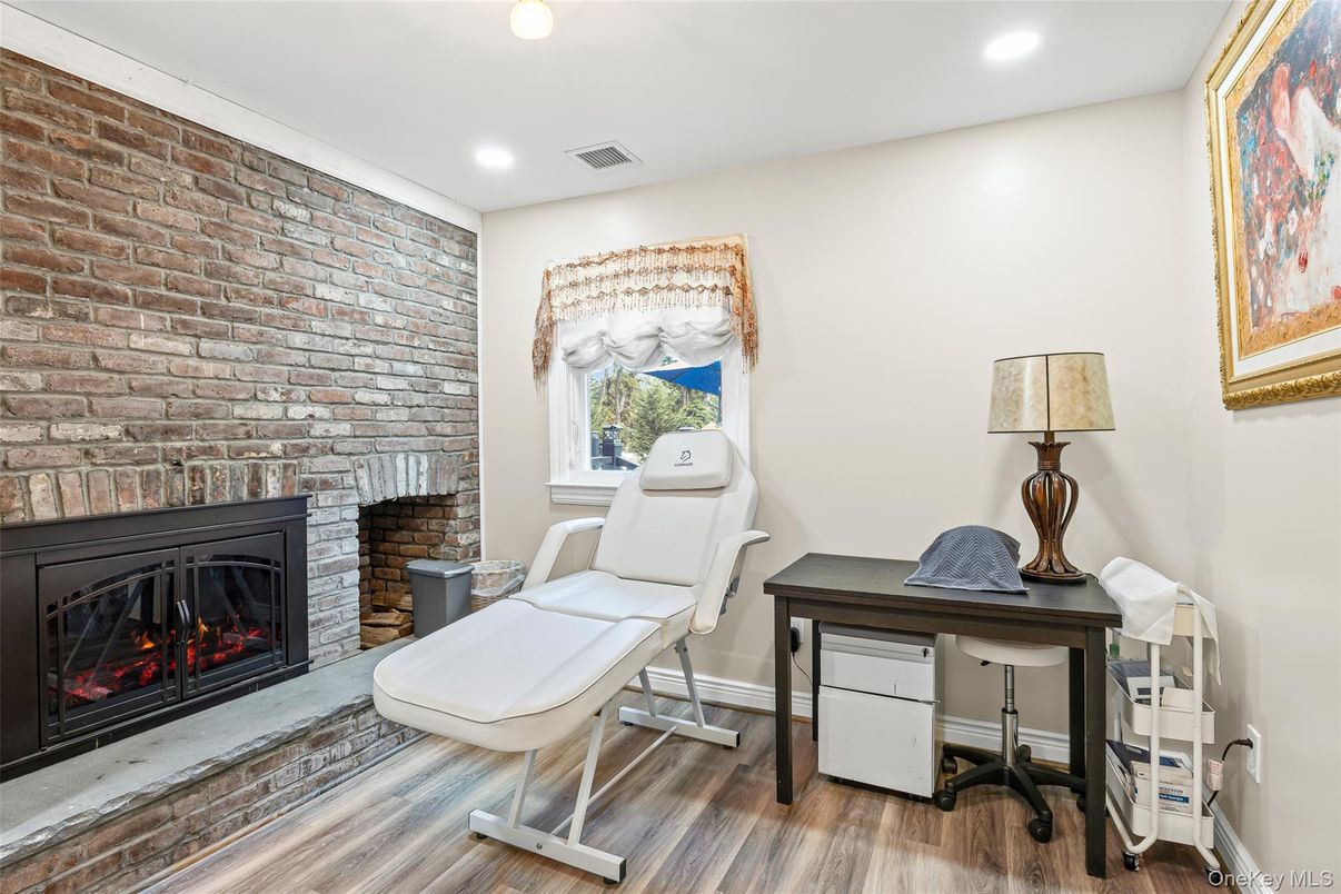 Fireplace, Interior, Recessed Lighting, Stone Walls, Wood Texture Flooring