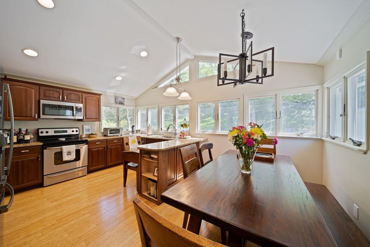 Dining room, Interior, Kitchen, Pendant Lights, Recessed Lighting, Stainless Steel Appliances, Wood Texture Flooring