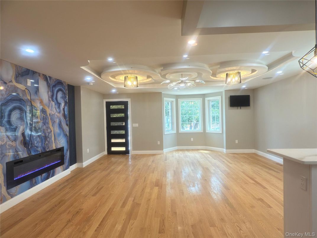 Empty room, Fireplace, Interior, Recessed Lighting, Wood Texture Flooring
