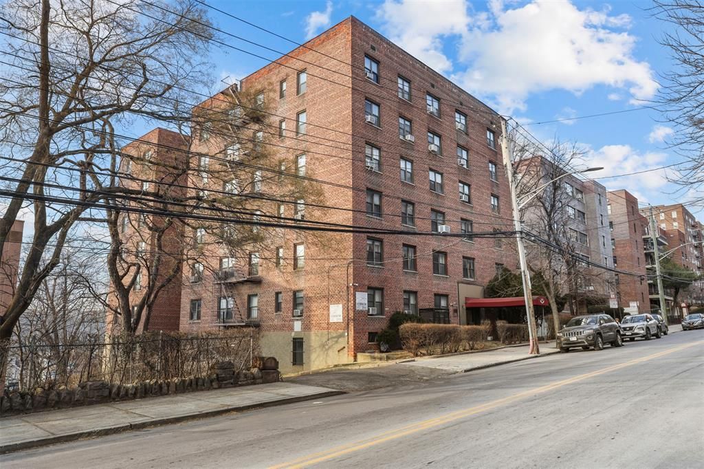 Exterior, Facade, Brick Facade, Condo Building