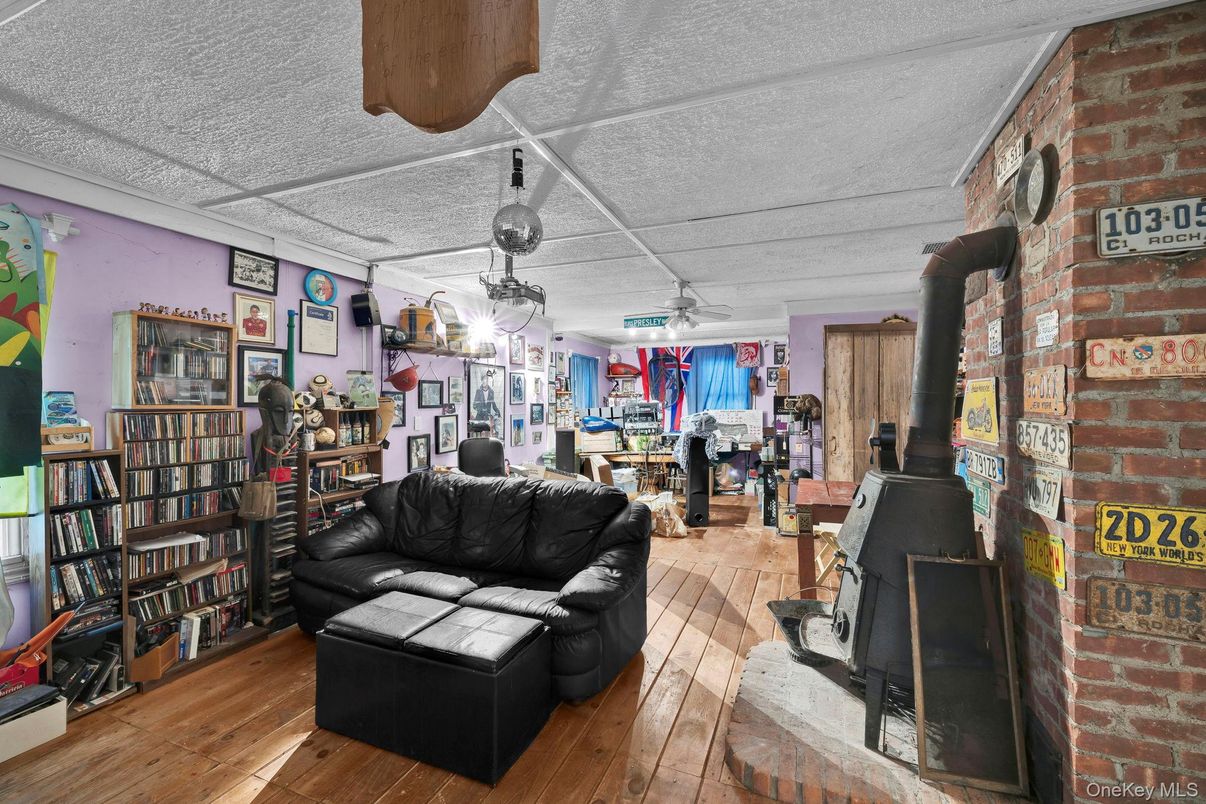 Dining room, Fireplace, Interior, Living room, Stone Walls, Wood Texture Flooring