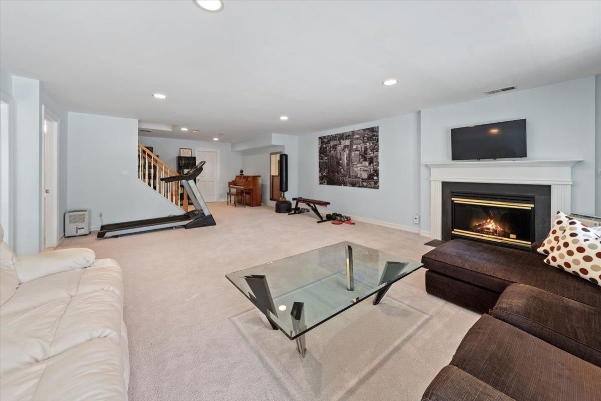 Fireplace, Fitness Equipment, Interior, Living room, Recessed Lighting