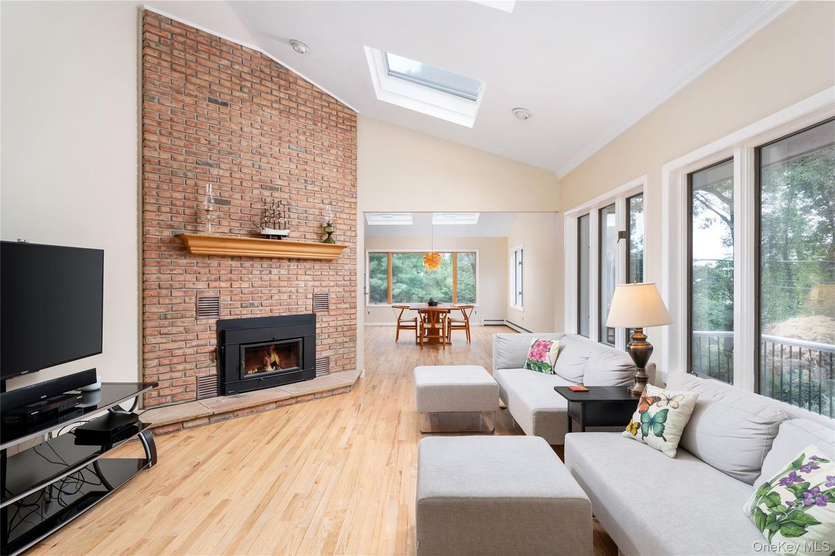Dining room, Fireplace, Interior, Living room, Stone Walls, Wood Texture Flooring