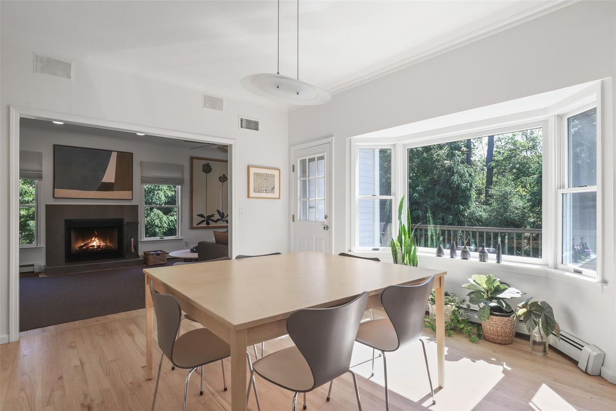 Dining room, Fireplace, Interior, Pendant Lights, Recessed Lighting, Wood Texture Flooring