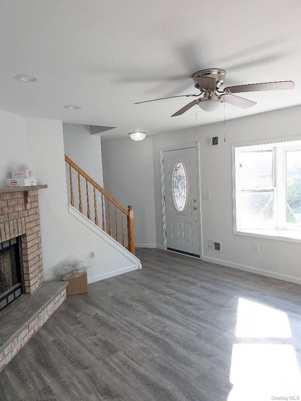 Empty room, Fireplace, Interior, Recessed Lighting, Wood Texture Flooring