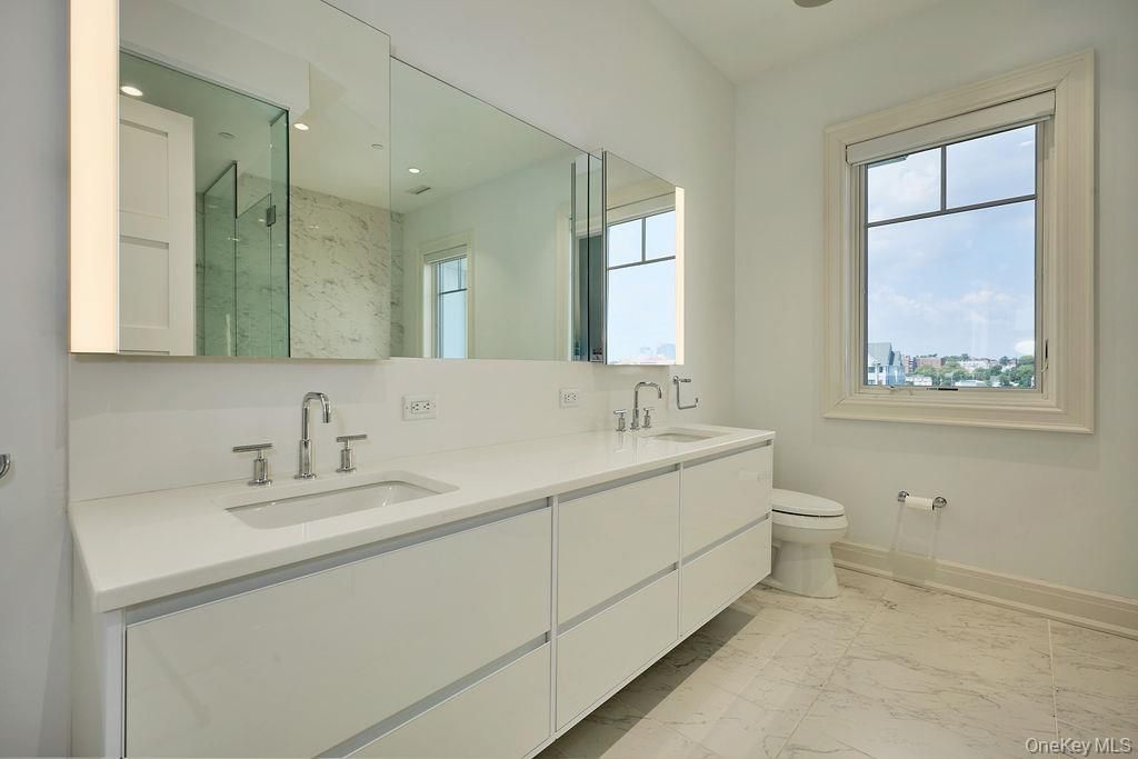Bathroom, Dual Sink Vanities, Glass Shower, Interior, Marble, Recessed Lighting