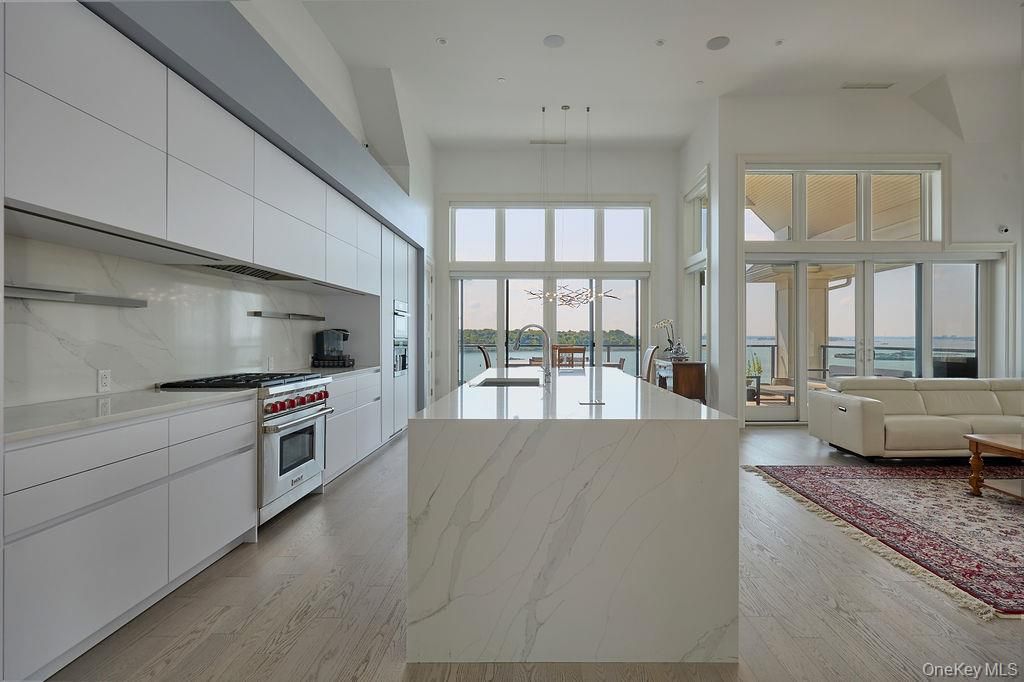 Interior, Kitchen, Living room, Marble Walls, Pendant Lights, Stainless Steel Appliances, Water, Wood Texture Flooring