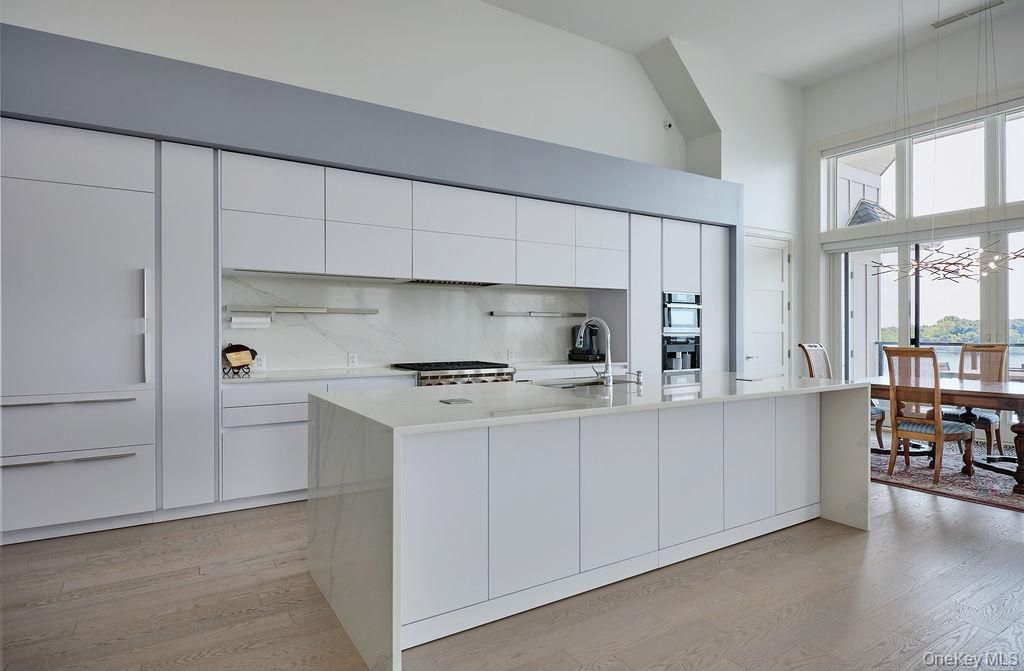 Dining room, Interior, Kitchen, Pendant Lights, Stainless Steel Appliances, Wood Texture Flooring