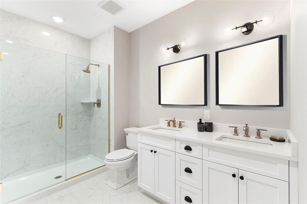 Bathroom, Dual Sink Vanities, Glass Shower, Interior, Marble Walls, Recessed Lighting
