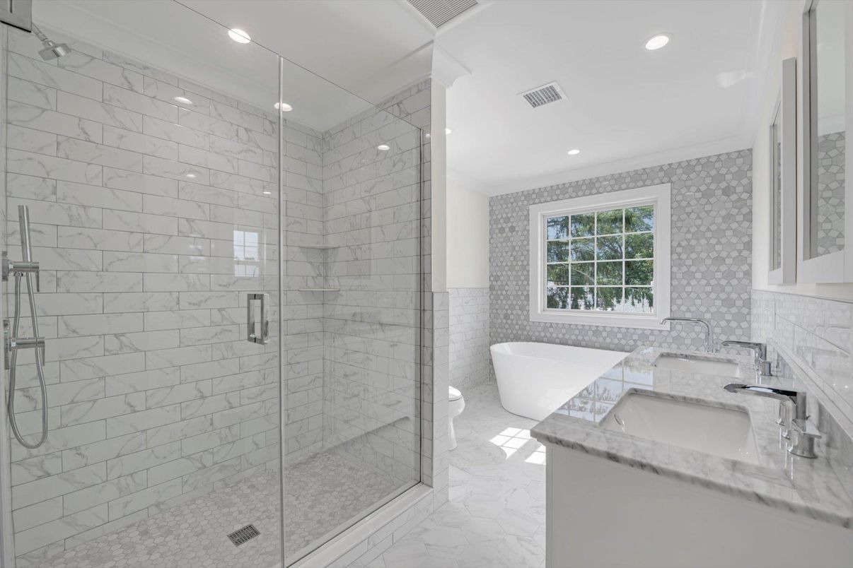 Bathroom, Dual Sink Vanities, Free Standing Baths, Glass Shower, Interior, Marble, Marble Walls, Recessed Lighting