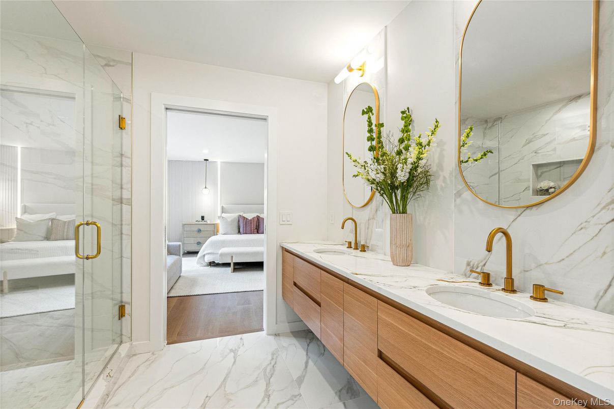 Bathroom, Bedroom, Dual Sink Vanities, Glass Shower, Interior, Marble, Marble Walls, Wood Texture Flooring