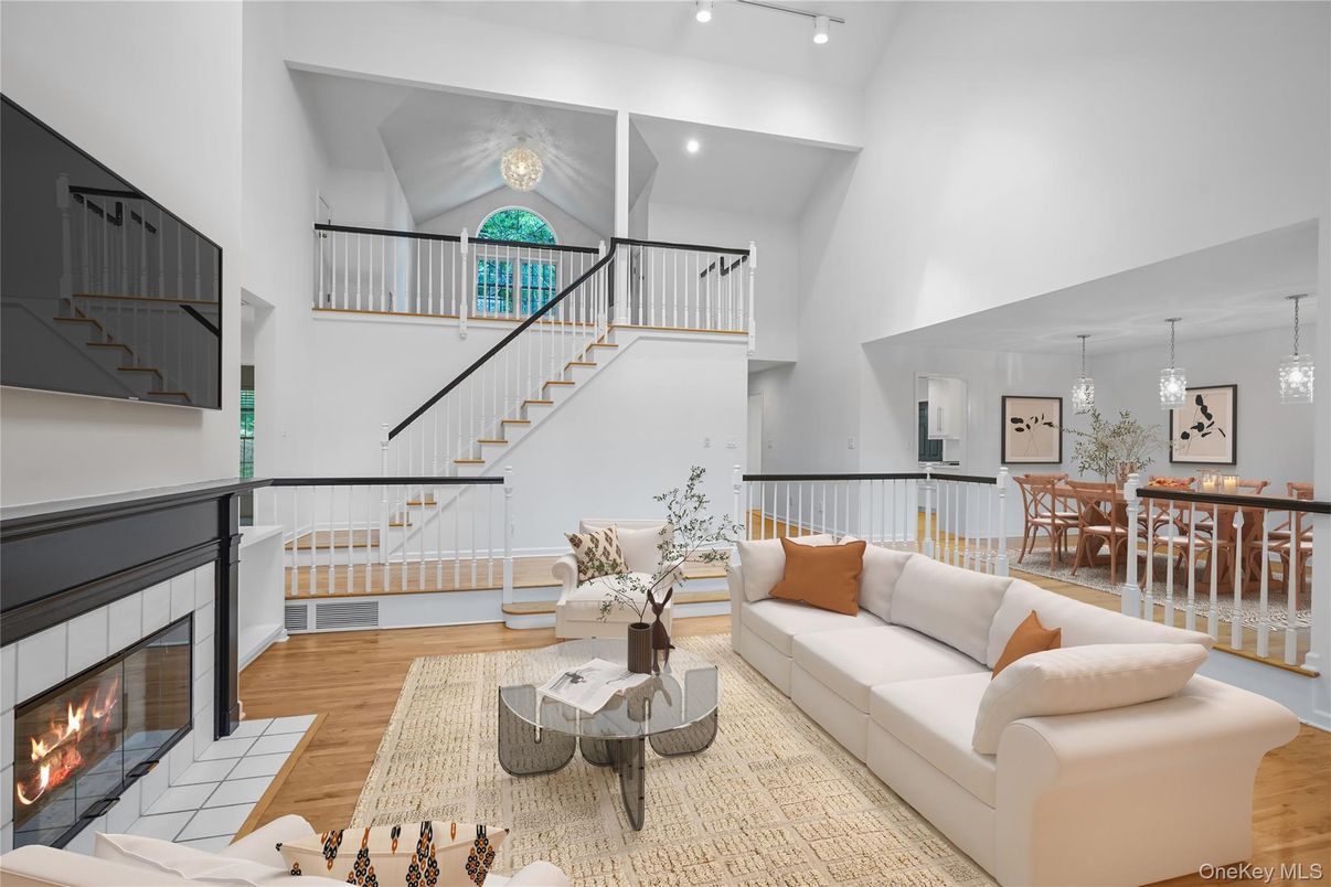 Dining room, Fireplace, Interior, Living room, Pendant Lights, Recessed Lighting, Wood Texture Flooring
