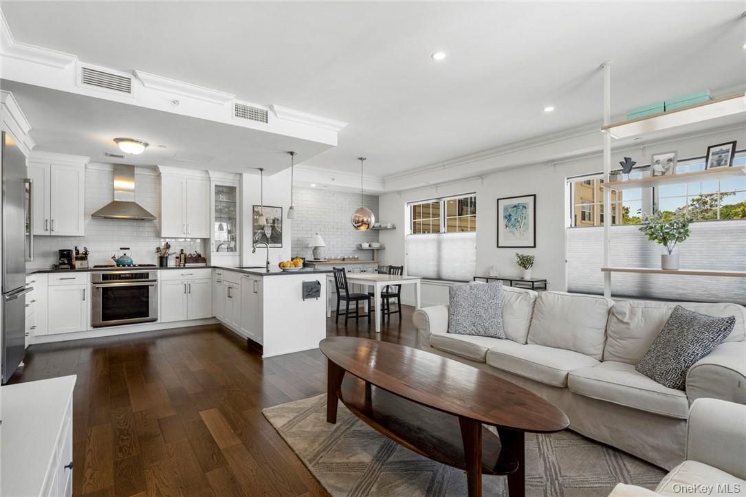 Dining room, Interior, Kitchen, Living room, Pendant Lights, Recessed Lighting, Stainless Steel Appliances, Wood Texture Flooring