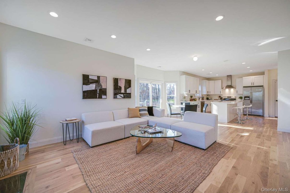Dining room, Interior, Kitchen, Living room, Recessed Lighting, Stainless Steel Appliances, Wood Texture Flooring