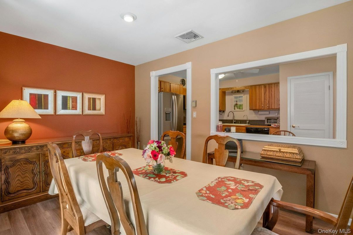 Dining room, Interior, Kitchen, Recessed Lighting, Stainless Steel Appliances, Wood Texture Flooring