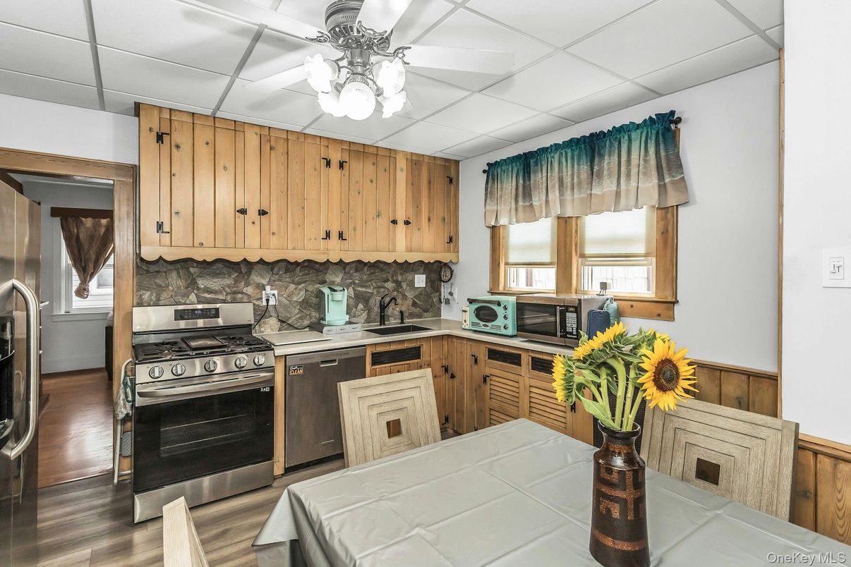 Interior, Kitchen, Stainless Steel Appliances, Tile Countertops, Wood Texture Flooring