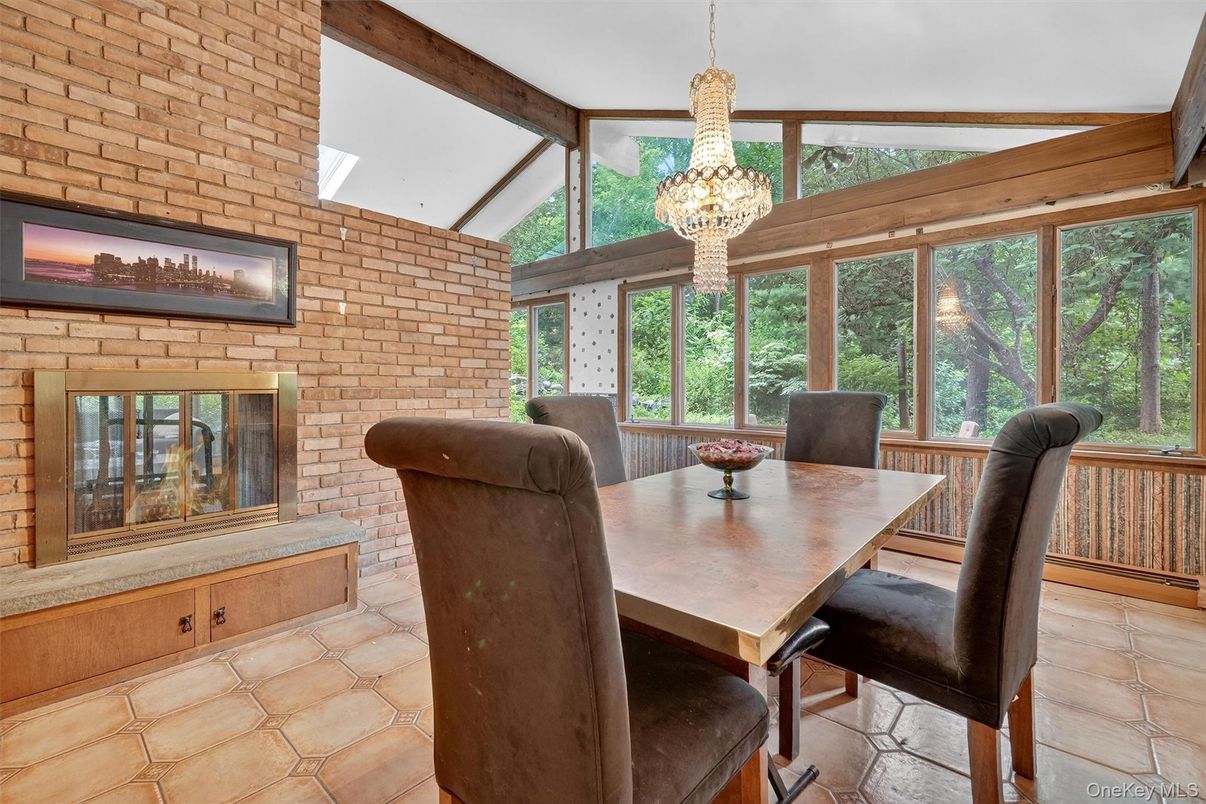 Chandelier, Dining room, Fireplace, Interior, Stone Walls, Wooden Beams