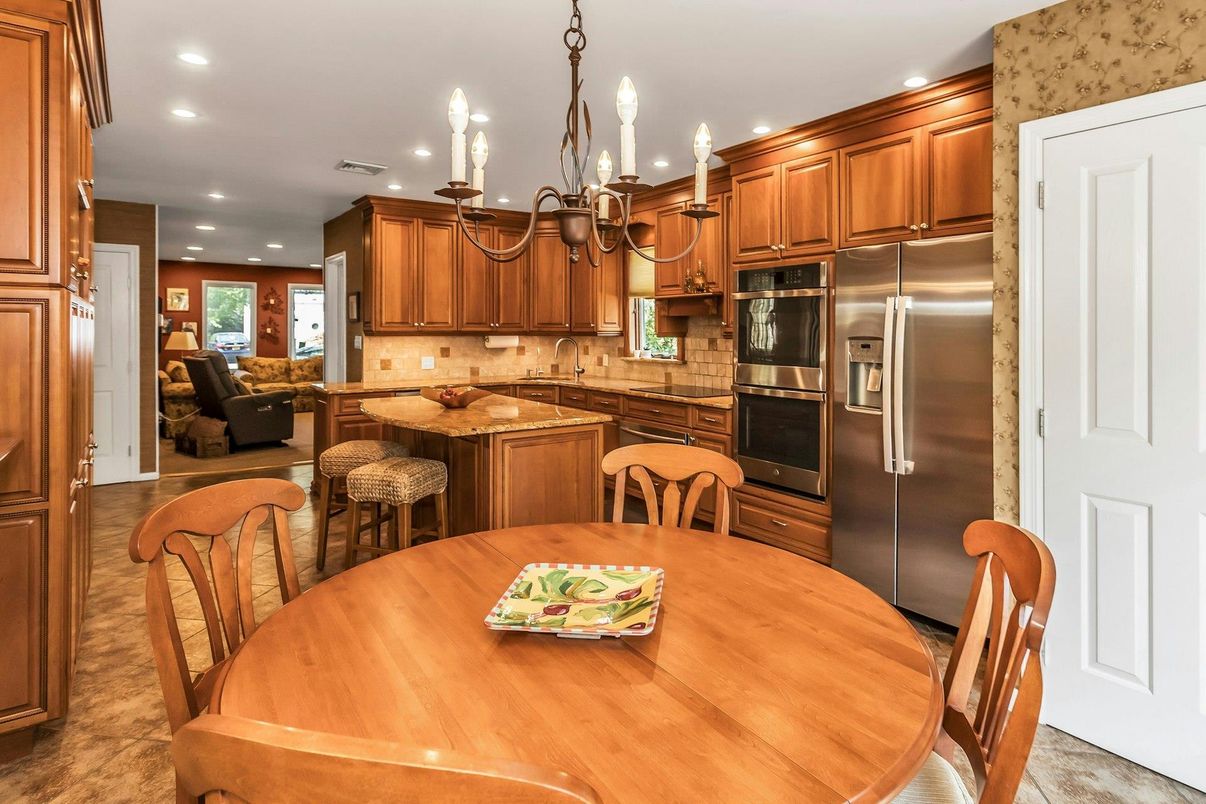 Chandelier, Dining room, Interior, Kitchen, Living room, Recessed Lighting, Stainless Steel Appliances