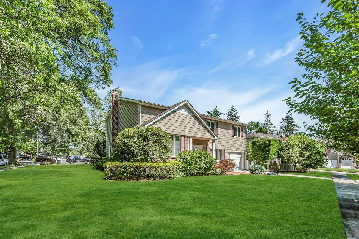 Attached, Backyard, Exterior, Facade, Brick Facade, Tudor Revival