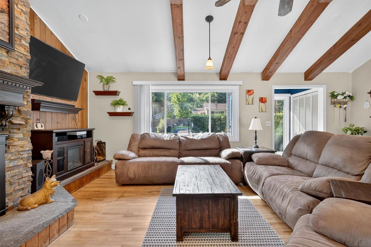 Fireplace, Interior, Living room, Pendant Lights, Stone Walls, Wooden Beams, Wood Texture Flooring