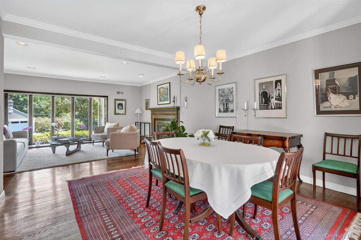 Chandelier, Dining room, Fireplace, Interior, Living room, Recessed Lighting, Wood Texture Flooring