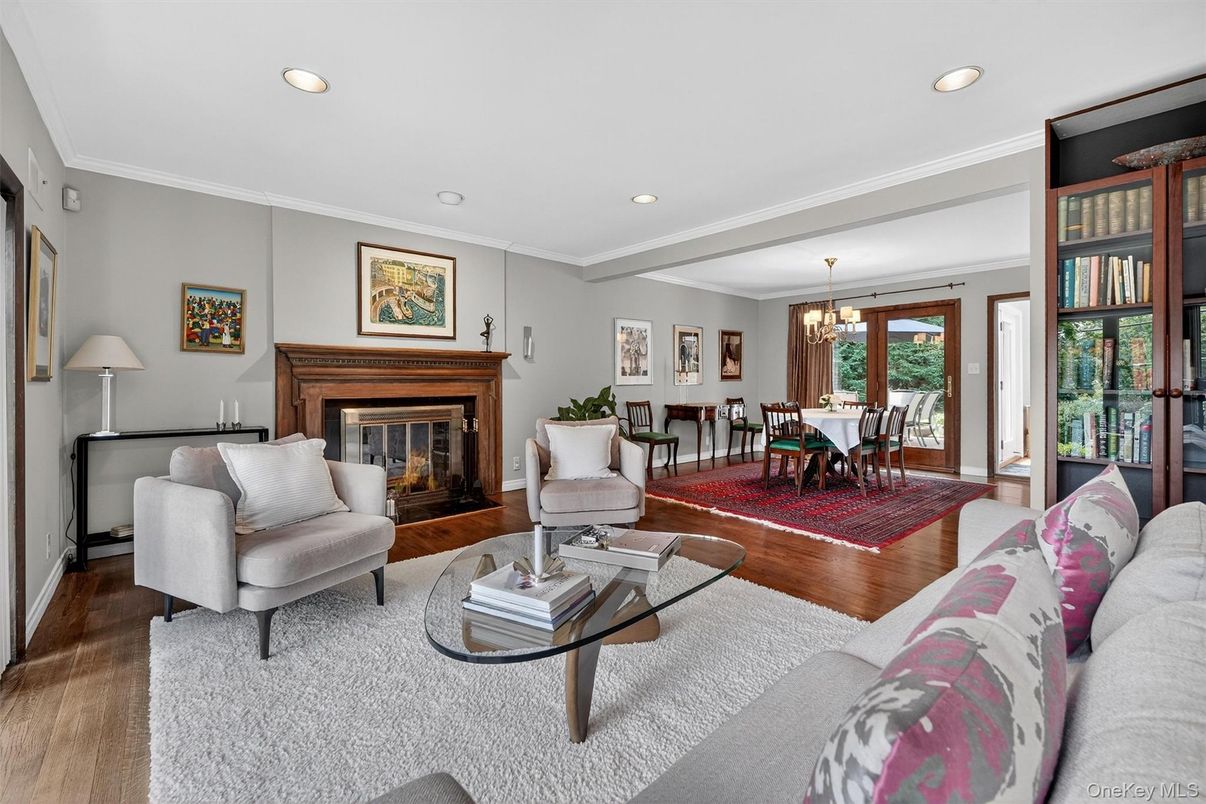 Chandelier, Dining room, Fireplace, Interior, Living room, Recessed Lighting, Wood Texture Flooring