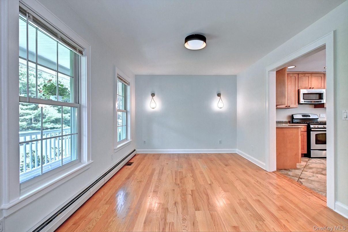 Empty room, Interior, Kitchen, Stainless Steel Appliances, Wood Texture Flooring