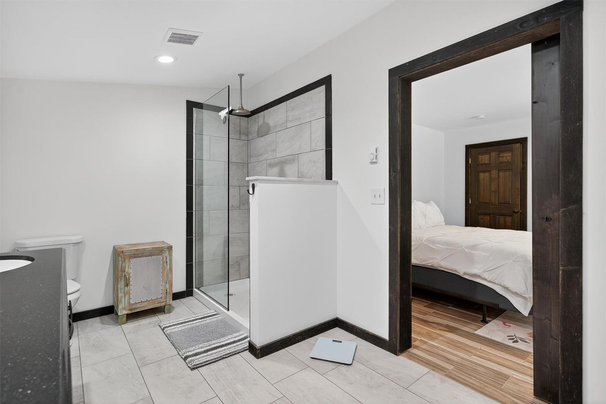 Bathroom, Bedroom, Glass Shower, Interior, Recessed Lighting, Wood Texture Flooring