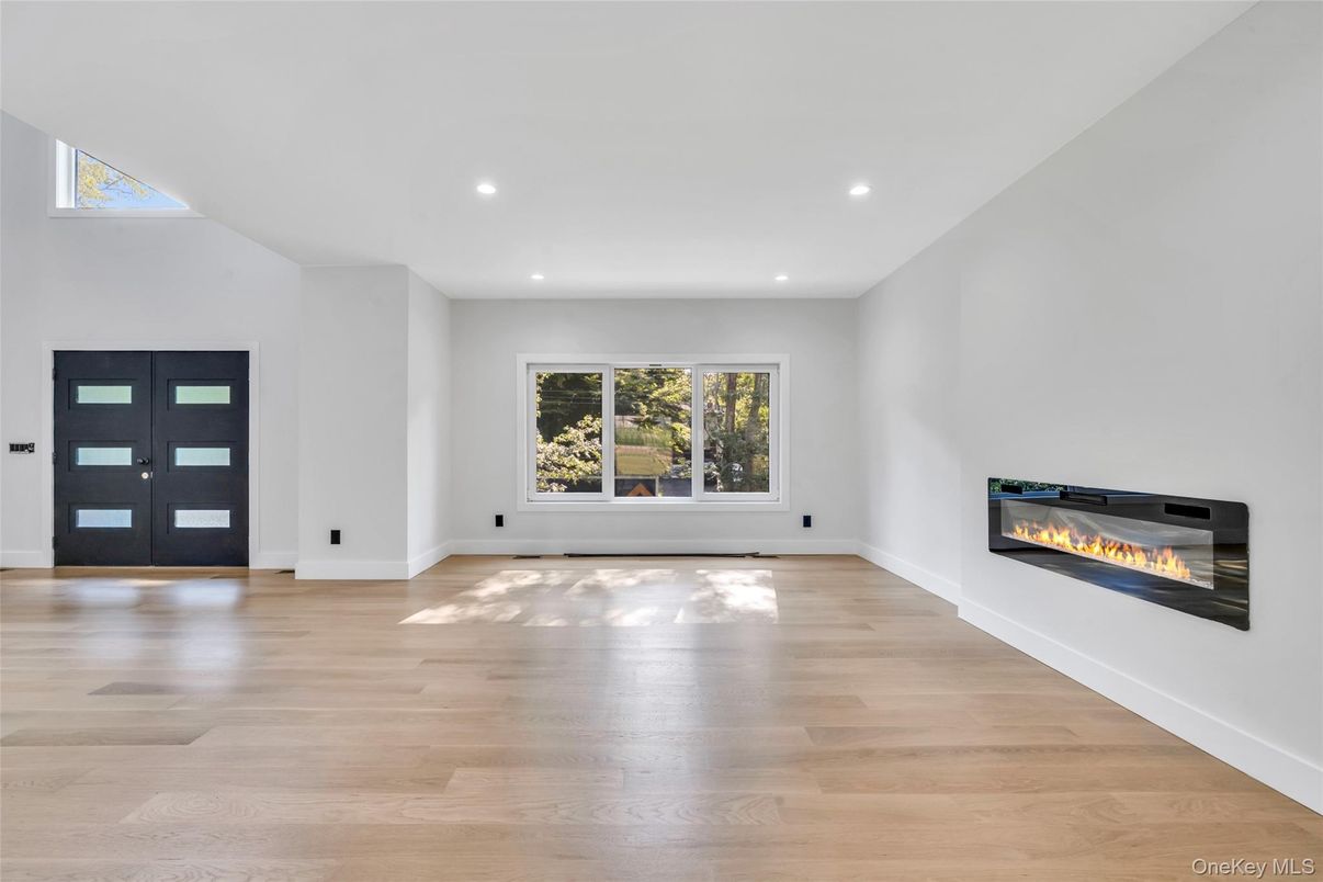Empty room, Fireplace, Interior, Recessed Lighting, Wood Texture Flooring