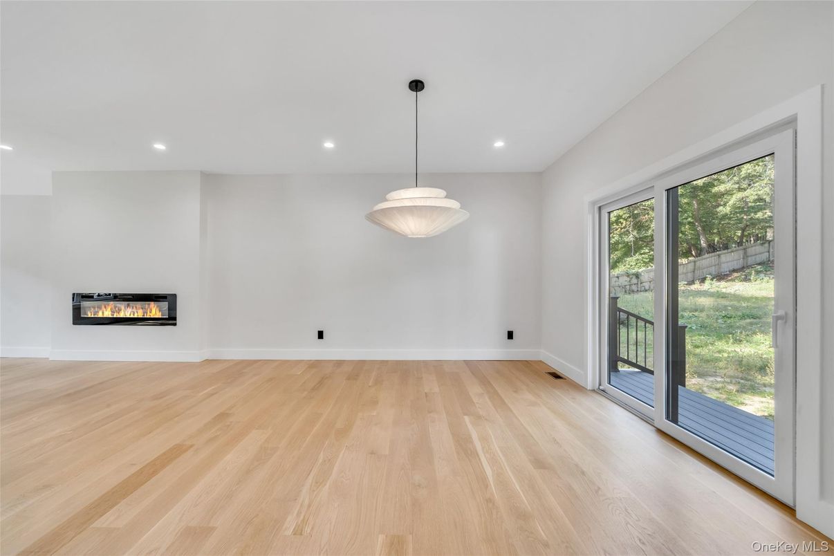 Empty room, Fireplace, Interior, Pendant Lights, Recessed Lighting, Wood Texture Flooring