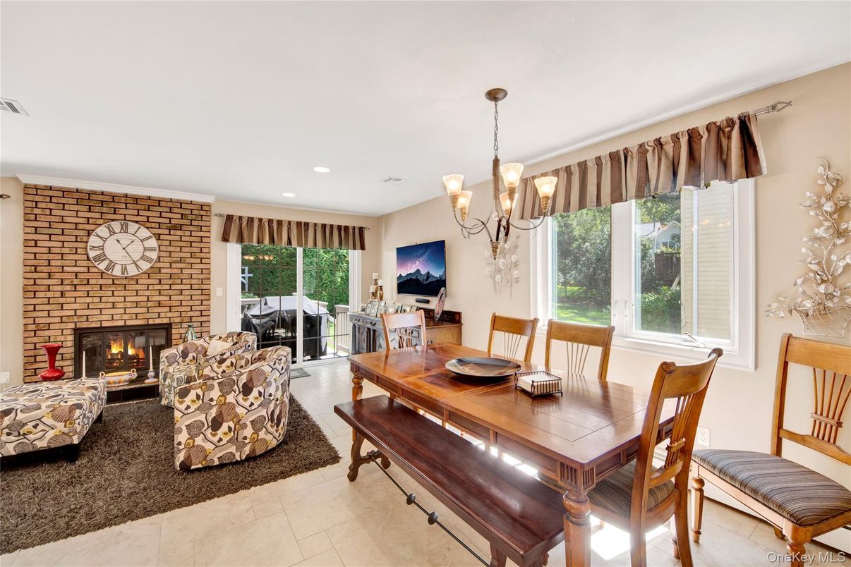 Chandelier, Dining room, Fireplace, Interior, Living room, Recessed Lighting, Stone Walls