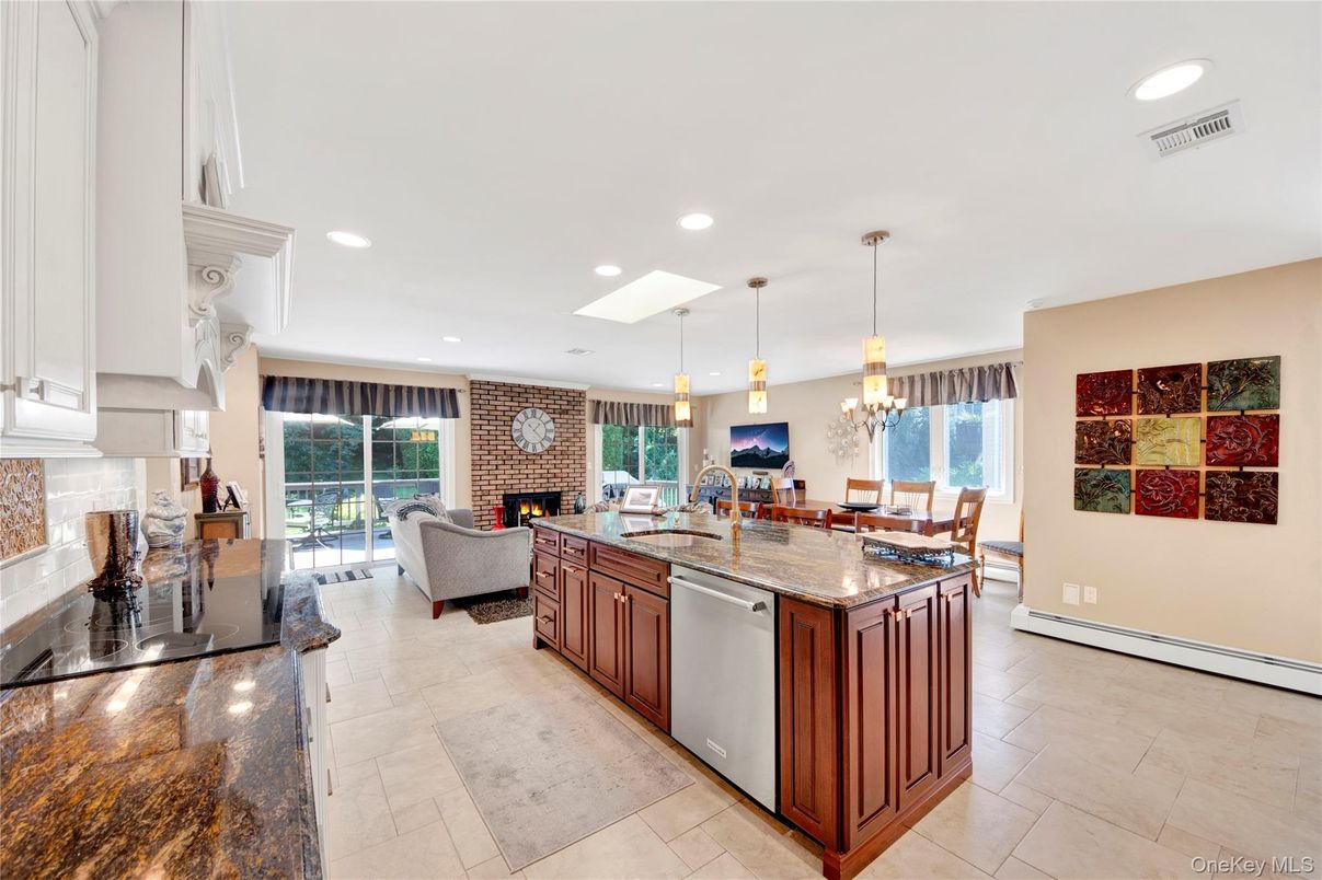 Dining room, Fireplace, Interior, Kitchen, Living room, Pendant Lights, Recessed Lighting, Stainless Steel Appliances