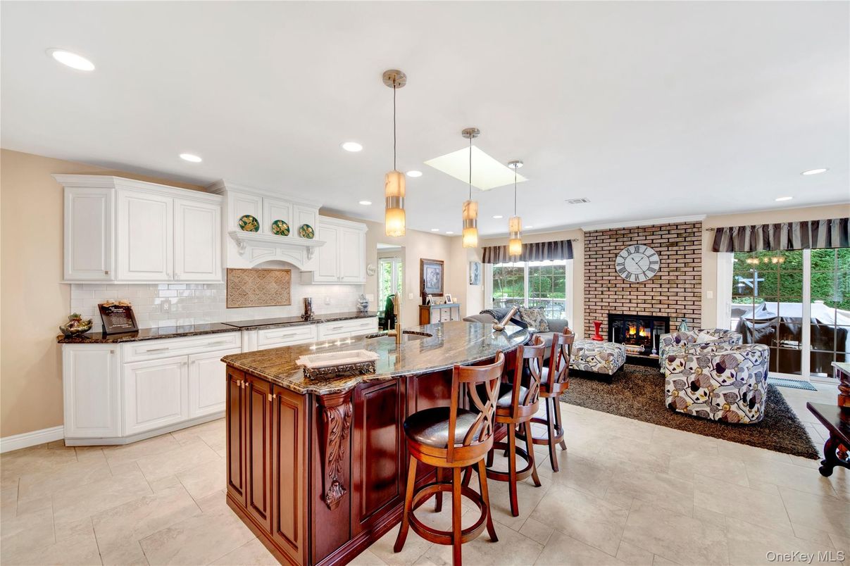Fireplace, Interior, Kitchen, Pendant Lights, Recessed Lighting, Stone Walls
