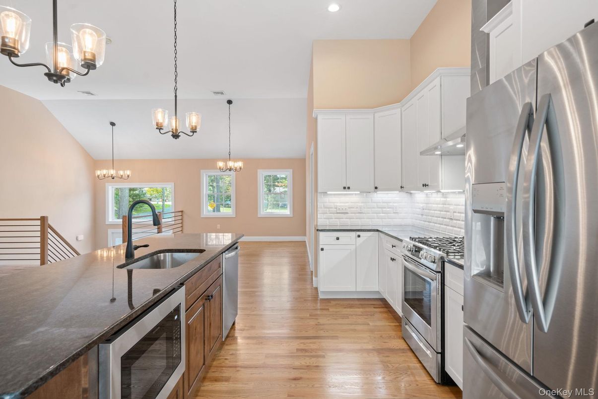 Chandelier, Interior, Kitchen, Pendant Lights, Recessed Lighting, Stainless Steel Appliances, Wood Texture Flooring