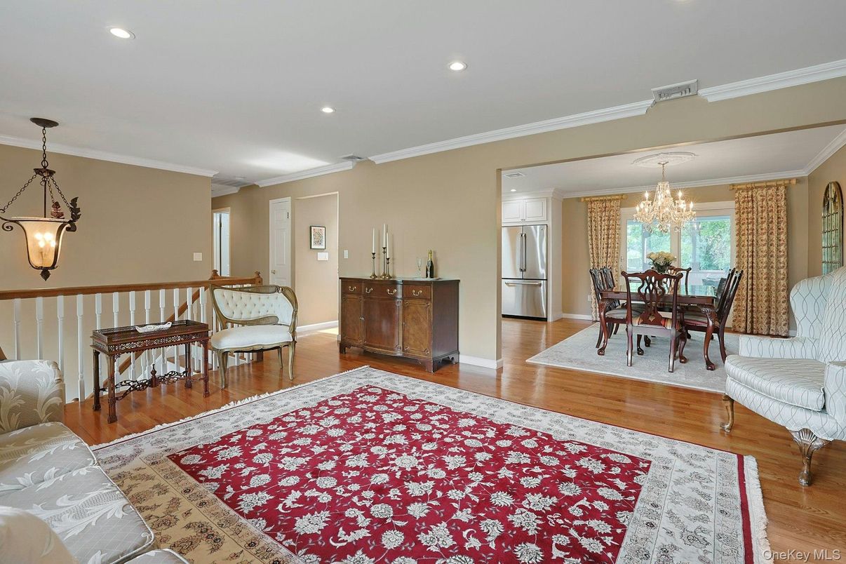 Chandelier, Dining room, Interior, Kitchen, Pendant Lights, Recessed Lighting, Stainless Steel Appliances, Wood Texture Flooring