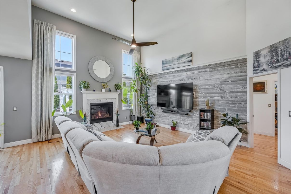 Fireplace, Interior, Living room, Pendant Lights, Recessed Lighting, Stone Walls, Wood Texture Flooring