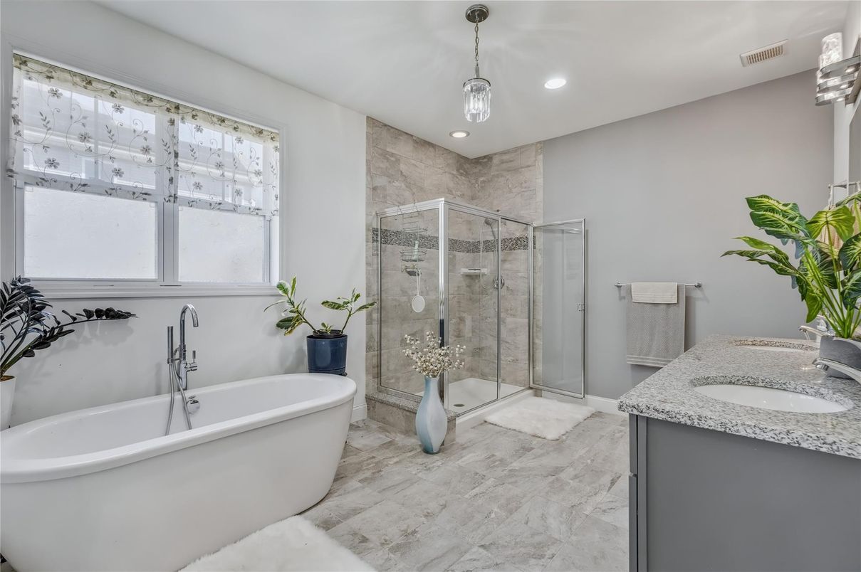 Bathroom, Dual Sink Vanities, Free Standing Baths, Glass Shower, Interior, Marble, Pendant Lights, Recessed Lighting