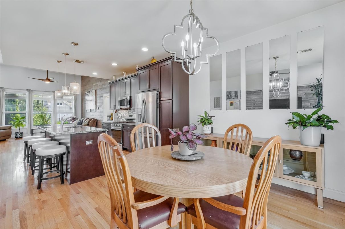 Dining room, Interior, Kitchen, Pendant Lights, Recessed Lighting, Stainless Steel Appliances, Wood Texture Flooring